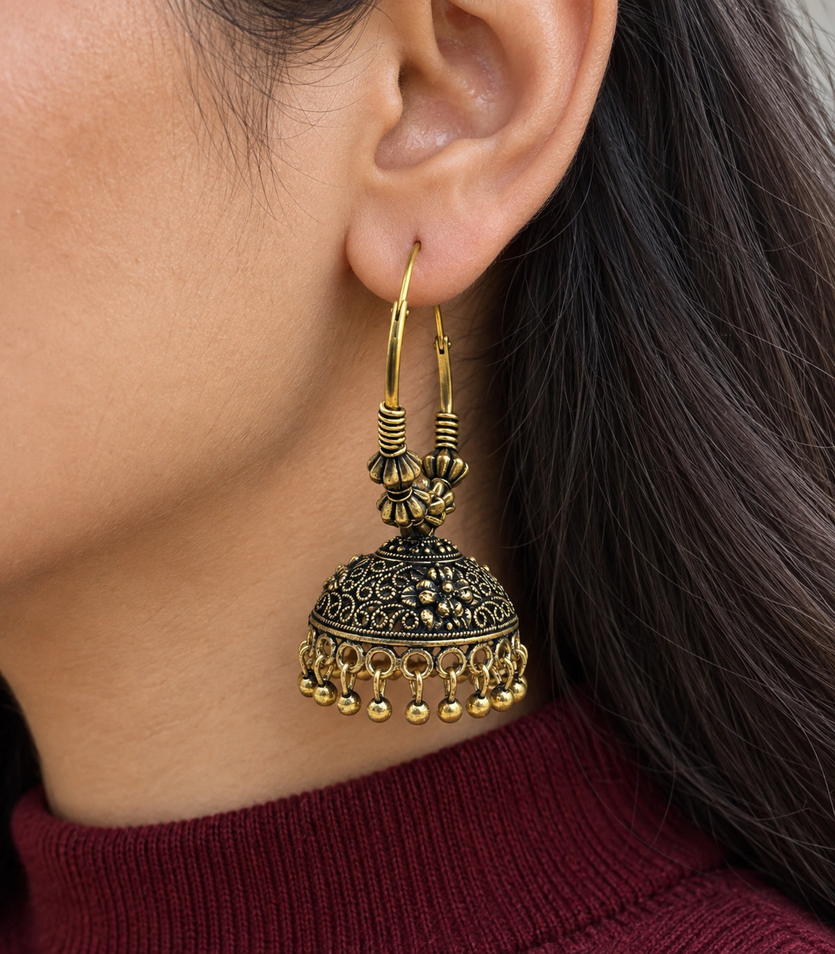 JIMIKI Beaded Hoop Floral Jhumka Earrings - Antique Gold close-up of earring worn on the ear #color_antique-gold