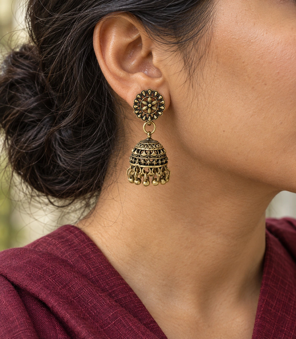 JIMIKI Antique Gold Floral Fan Dome Jhumka Earrings - earring worn with a clear view of the design #color_antique-gold