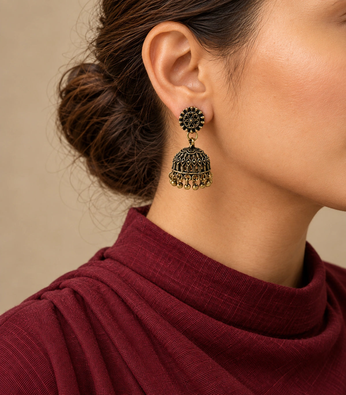 JIMIKI Antique Gold Heart Flower Openwork Jhumka Earrings in Antique Gold - editorial worn view #color_antique-gold