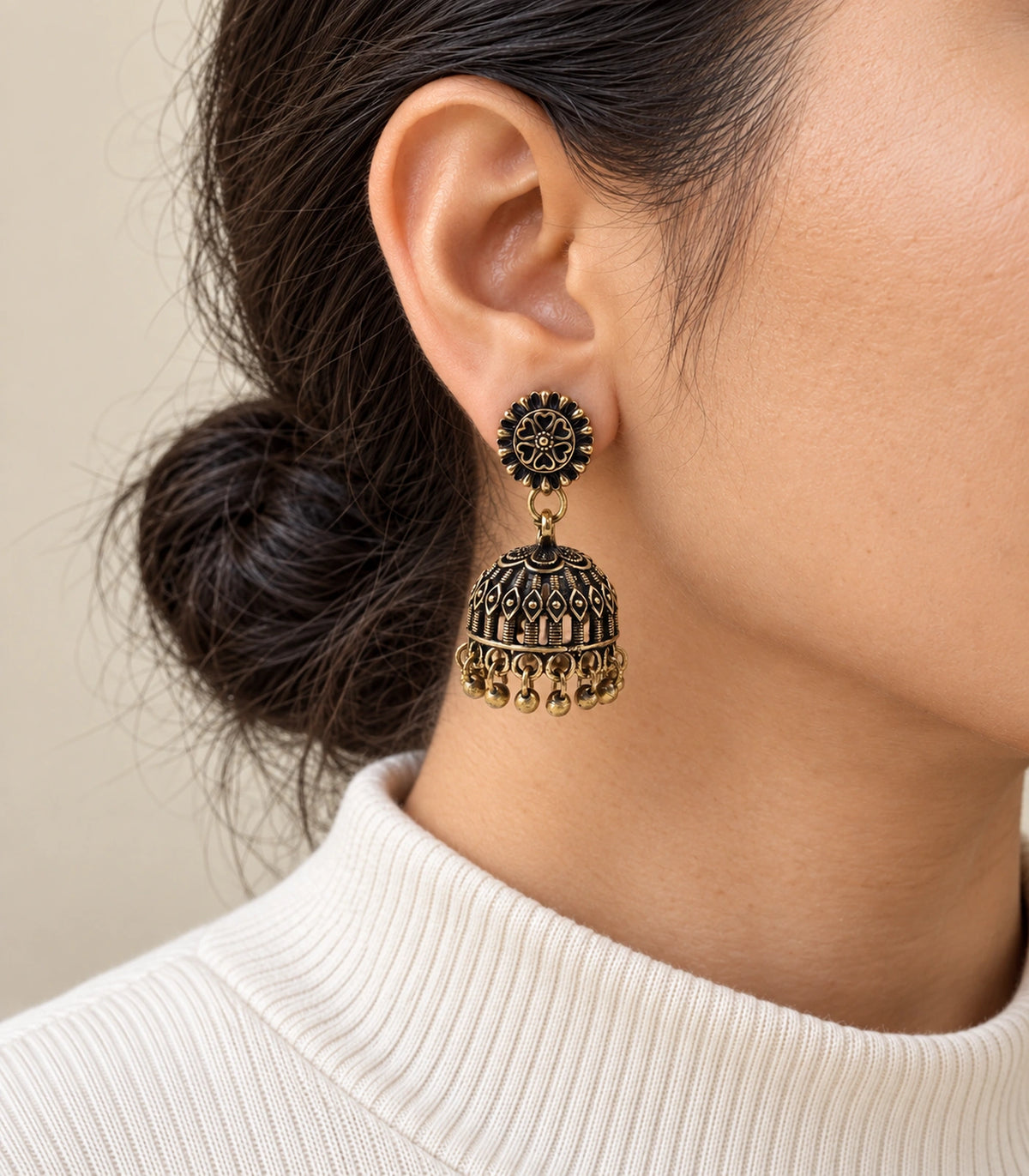 JIMIKI Antique Gold Heart Flower Openwork Jhumka Earrings in Antique Gold - worn styling view #color_antique-gold