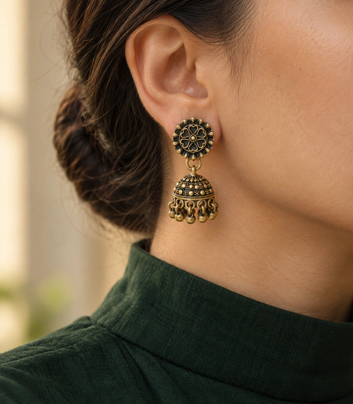 JIMIKI Antique Gold Heart Flower Stud Dotted Jhumka Earrings in Antique Gold - editorial worn view #color_antique-gold