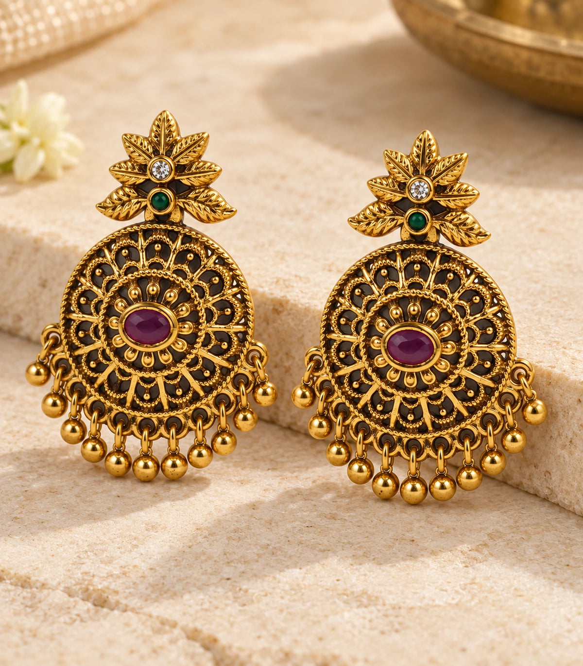 JIMIKI magenta floral disc earring pair styled on warm stone #color_antique-gold-magenta-green