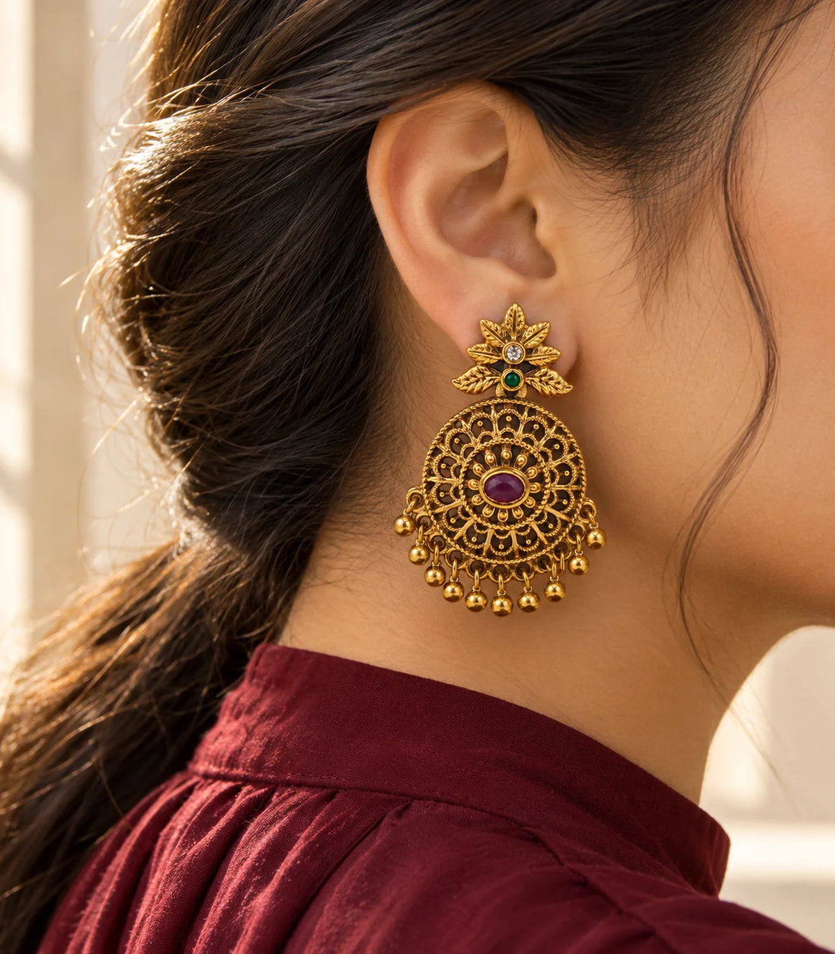 Editorial view of JIMIKI magenta floral disc earrings worn with ivory clothing #color_antique-gold-magenta-green