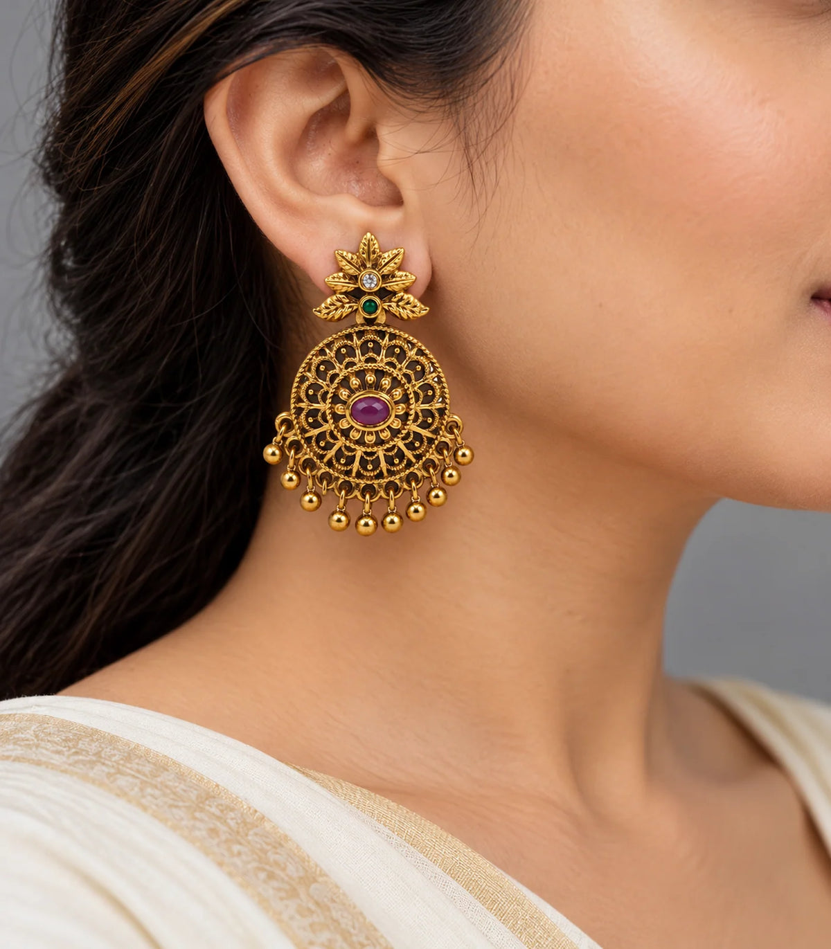 JIMIKI magenta floral disc earrings worn with ivory clothing #color_antique-gold-magenta-green
