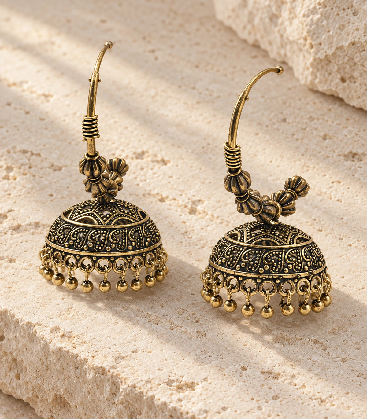 JIMIKI Paisley Beaded Hoop Jhumka Earrings in Antique Gold - editorial flatlay #color_antique-gold