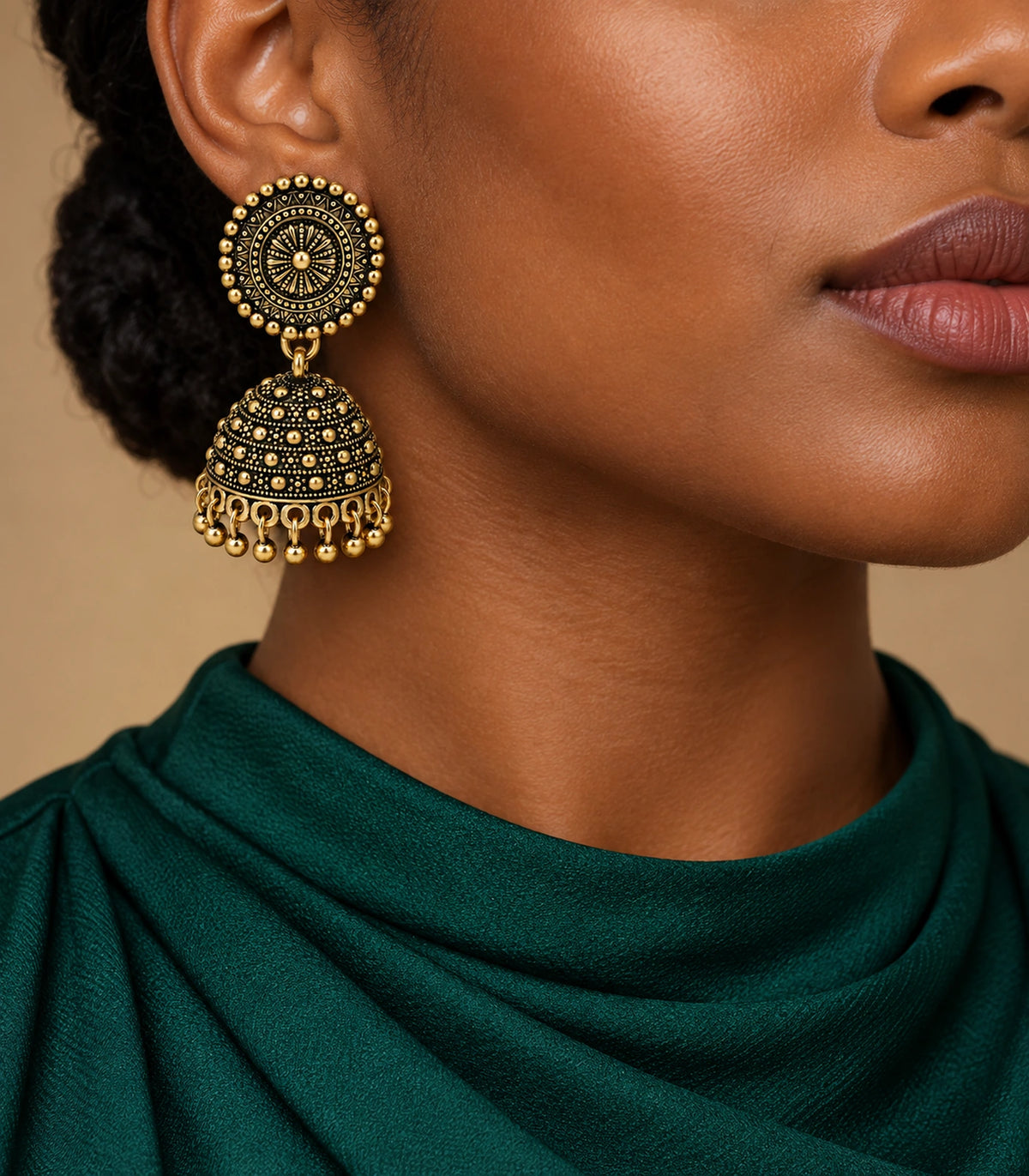 JIMIKI Antique Gold Sunburst Medallion Jhumka Earrings - Earring styled with a teal outfit #color_antique-gold