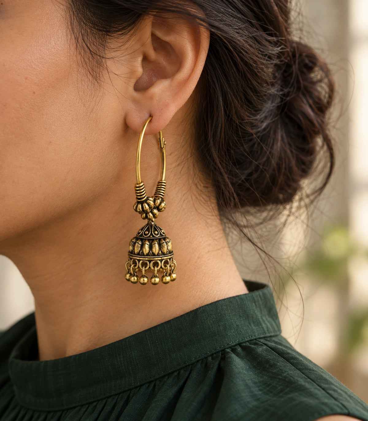 JIMIKI Antique Gold Three Bead Hoop Leaf Jhumka Earrings in Antique Gold - editorial worn view #color_antique-gold
