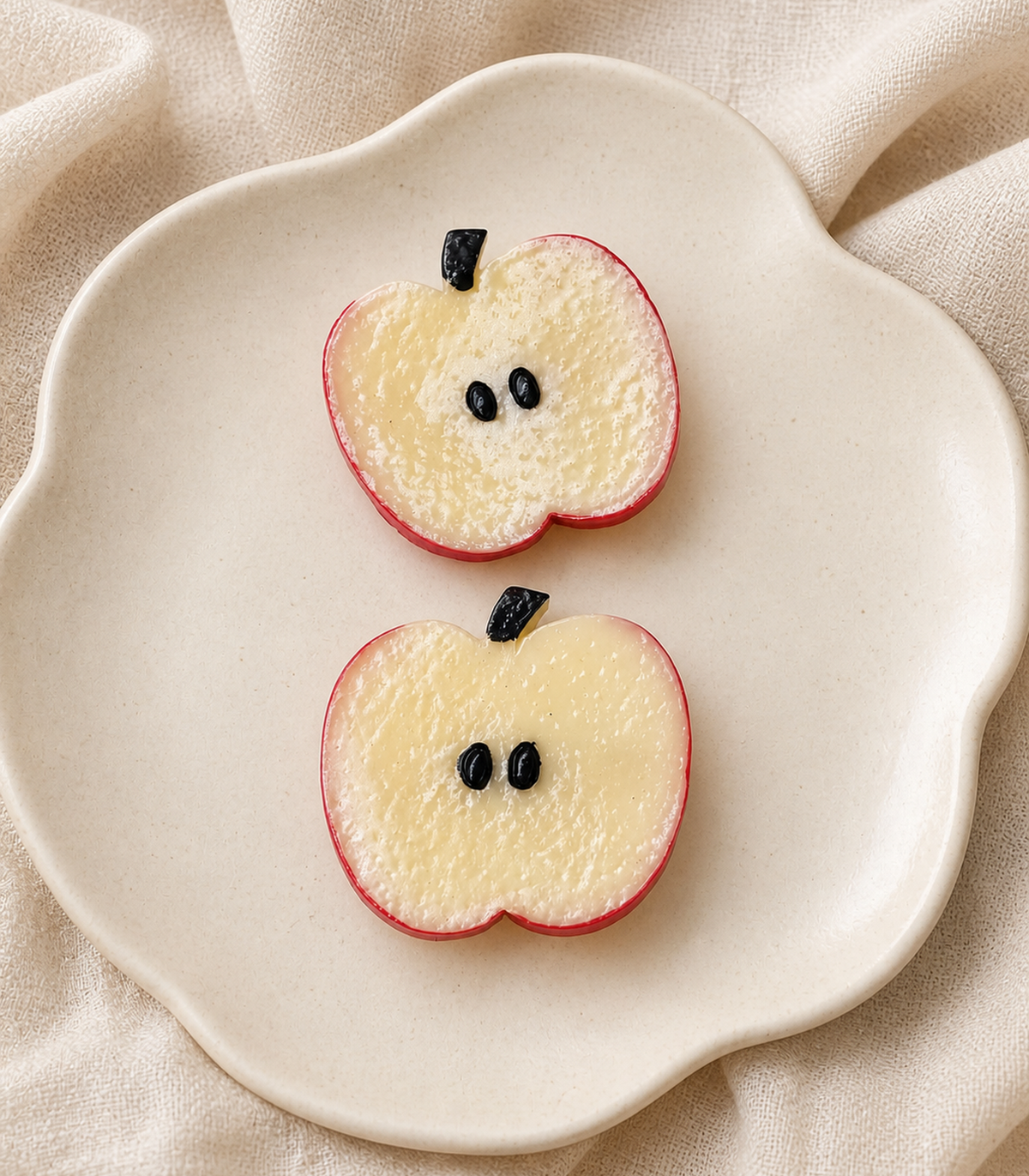 Apple Slice Barrette Pair editorial flat lay