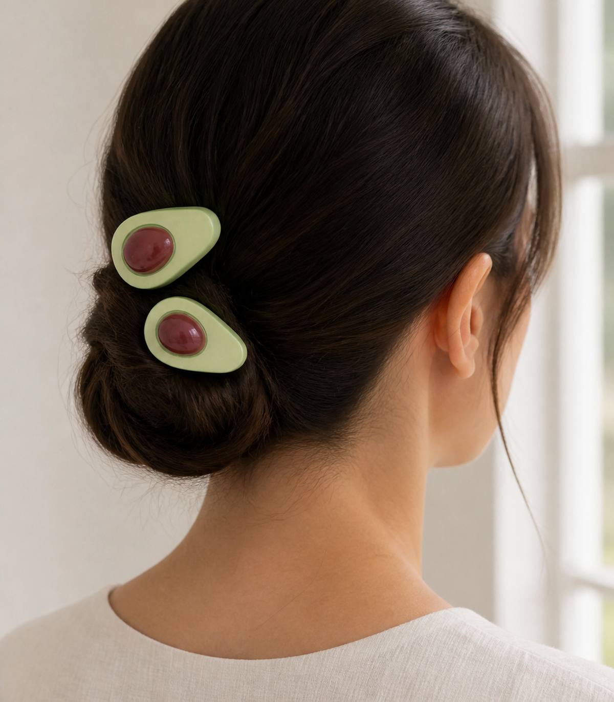 JIMIKI Elongated Avocado Slice Barrette Pair in Pale Green / Brown, editorial hairstyle view