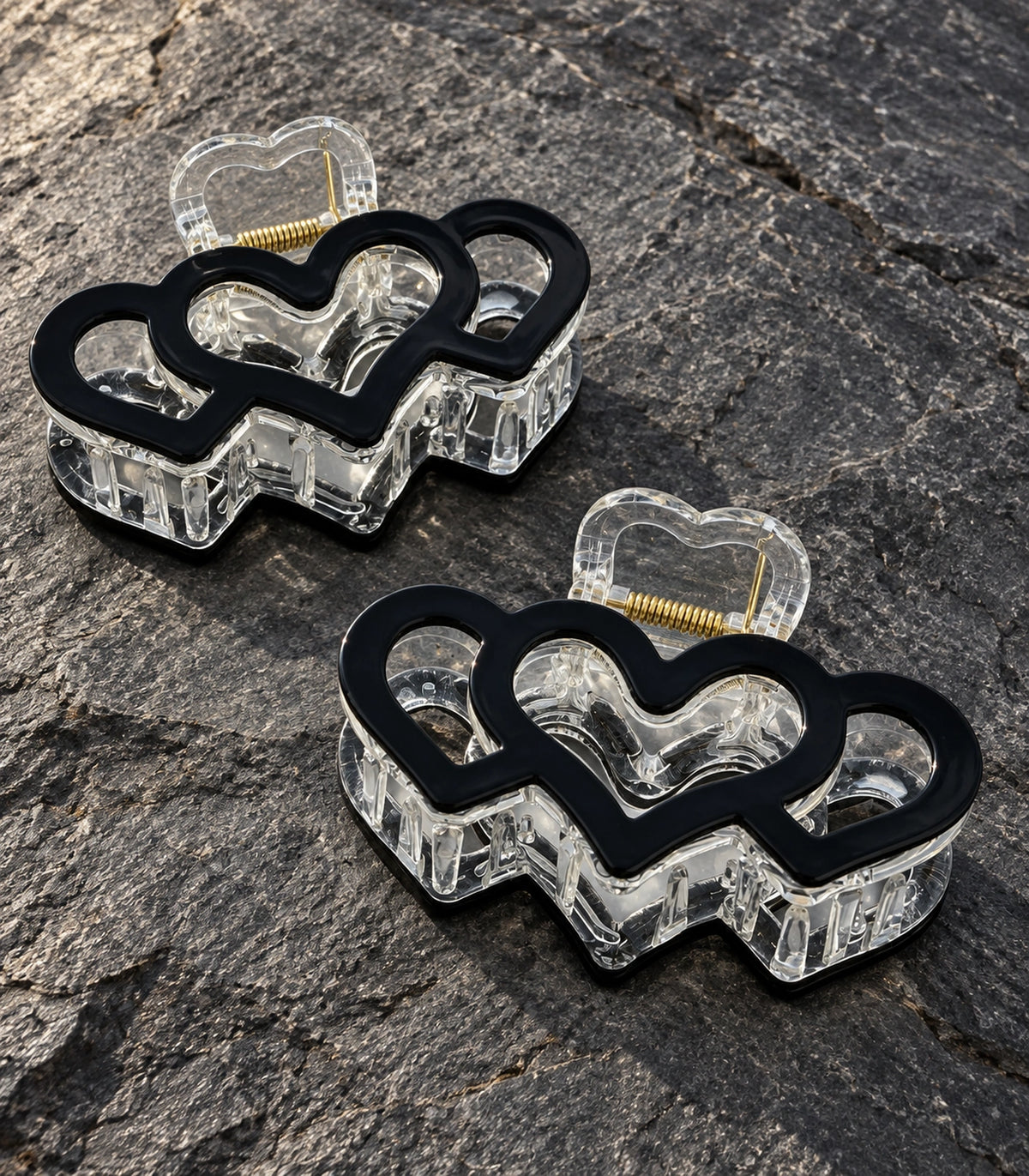 JIMIKI Triple Heart Hair Claw Clips in Black, editorial flat lay #color_black