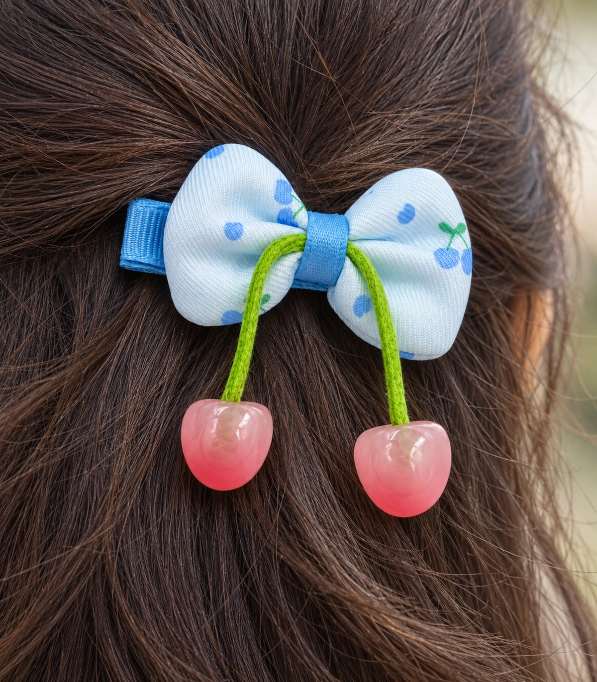 JIMIKI Cherry Print Bow Hair Clip With Cherry Charms in Blue, close-up detail #color_blue