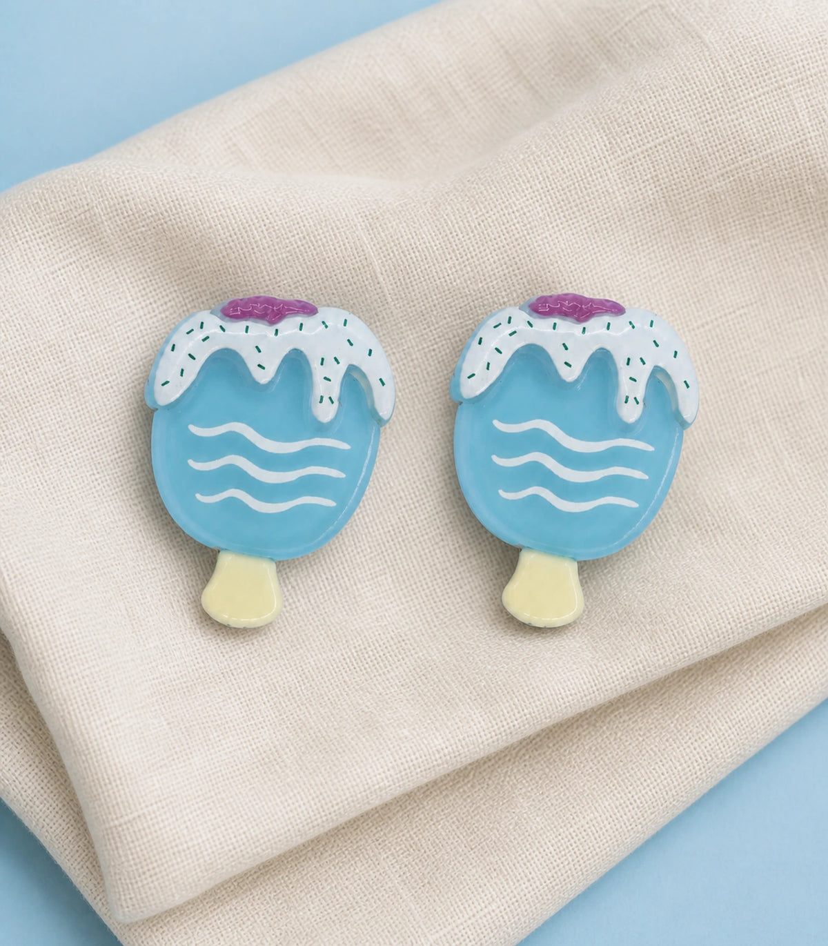 Editorial flat lay of the Blue Frosted Popsicle Clip Pair
