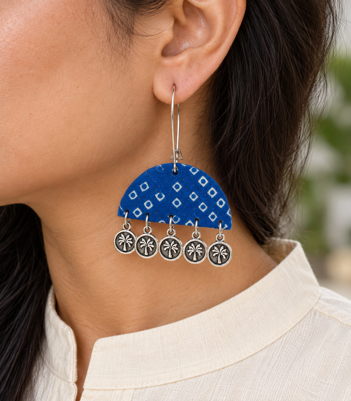 Blue Geometric Fabric Coin Earrings – closeup view