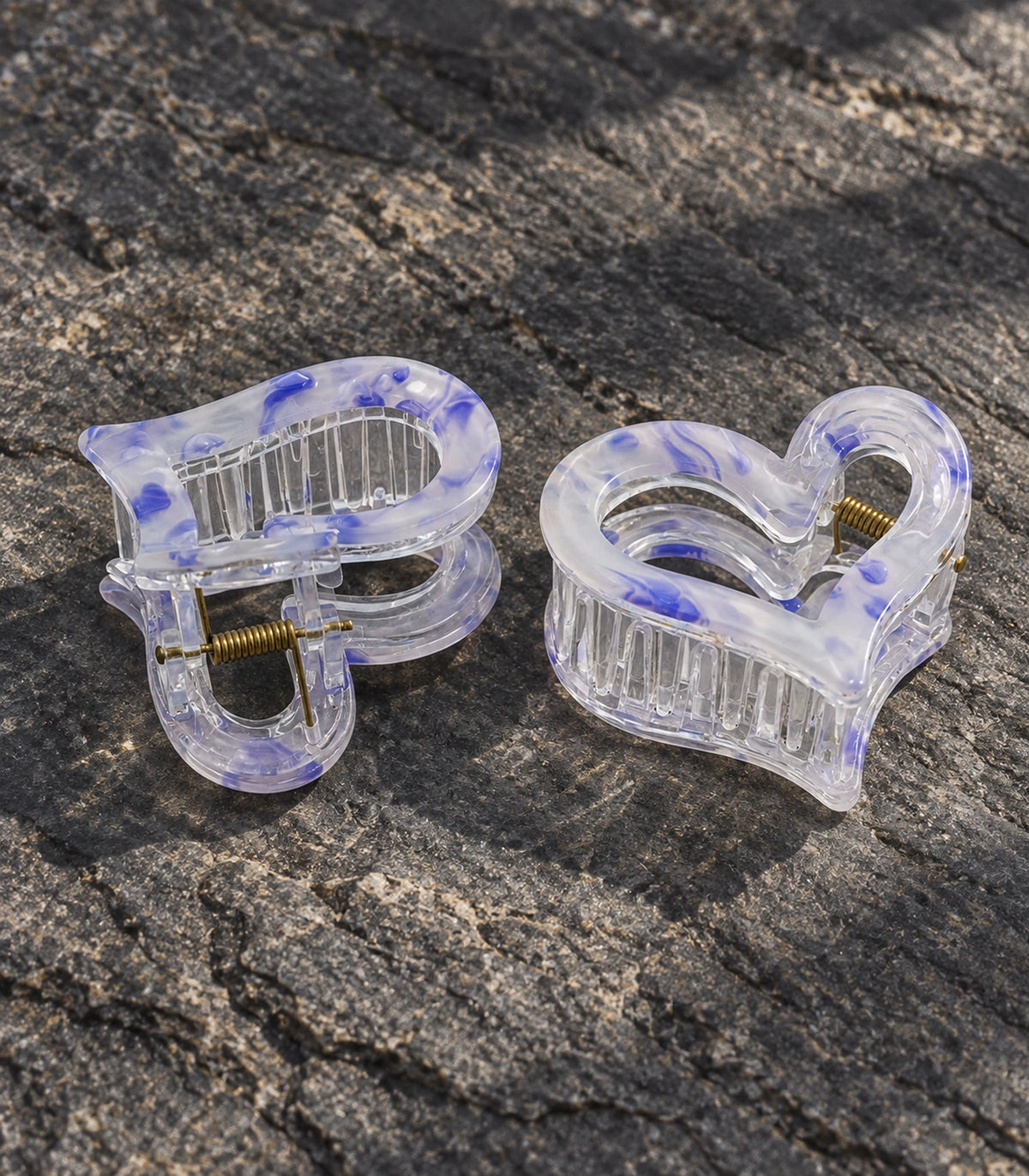 JIMIKI Marbled Heart Hair Claw Clips in Blue, editorial flat lay #color_blue