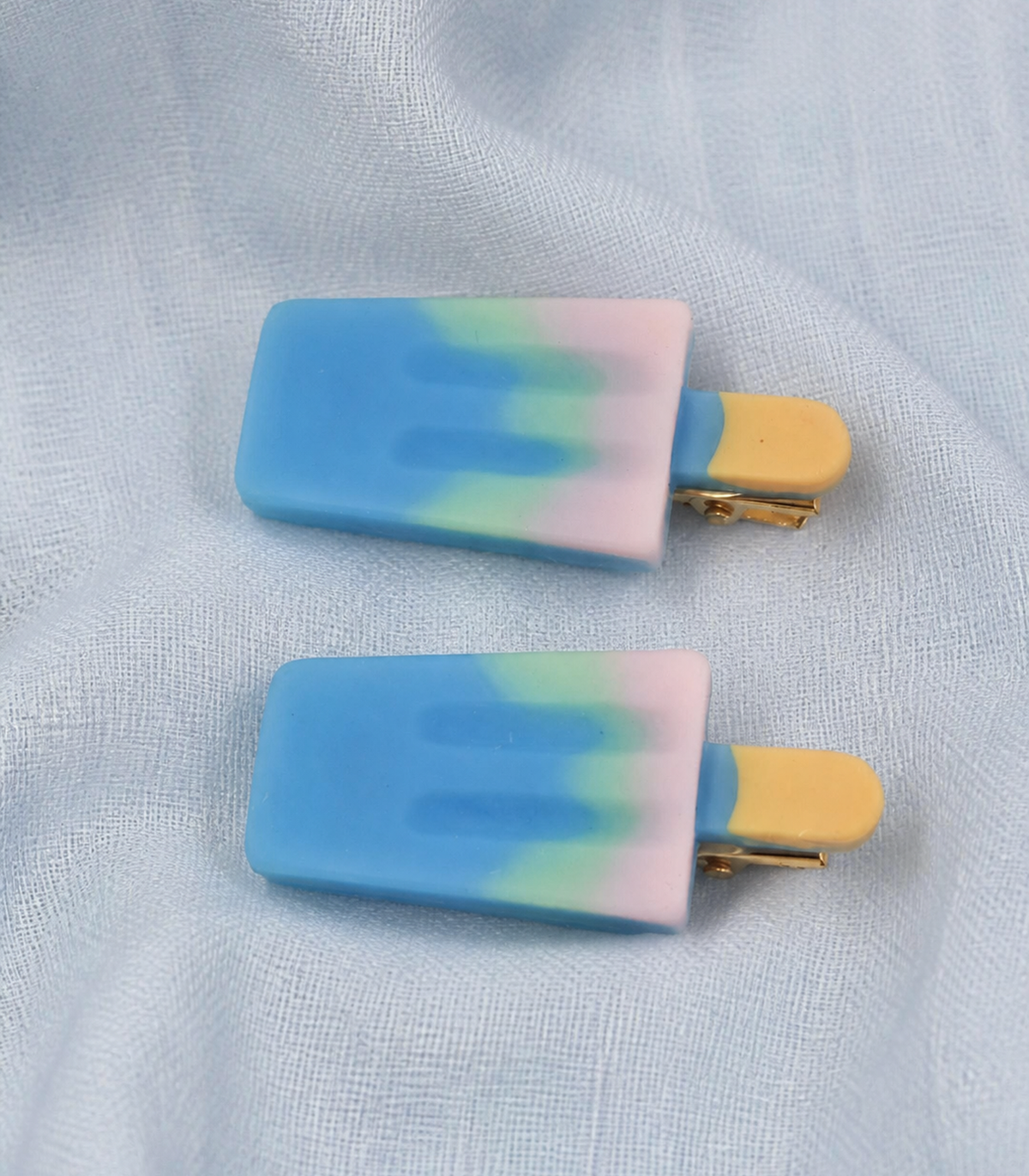 Blue Pink Popsicle Clip Pair in close-up detail