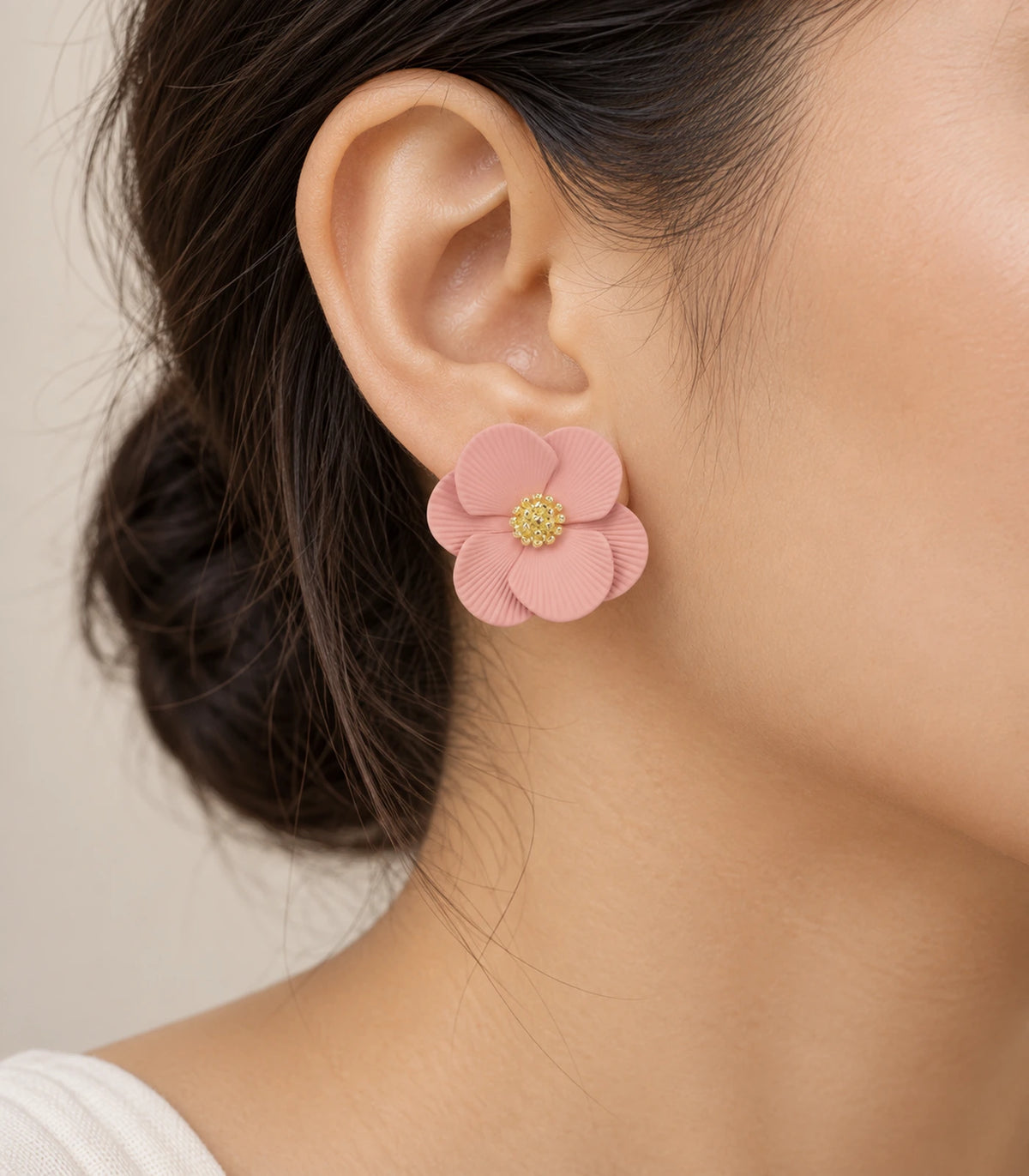 JIMIKI Blush Pink ribbed flower stud earrings, worn view showing the flower stud #color_blush pink