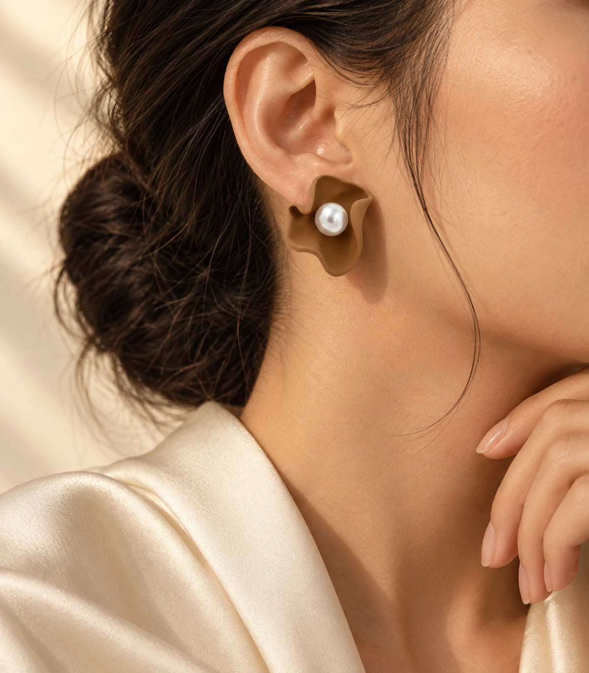 JIMIKI Folded Calla Pearl Stud Earrings, Camel — earrings styled with an outfit #color_camel