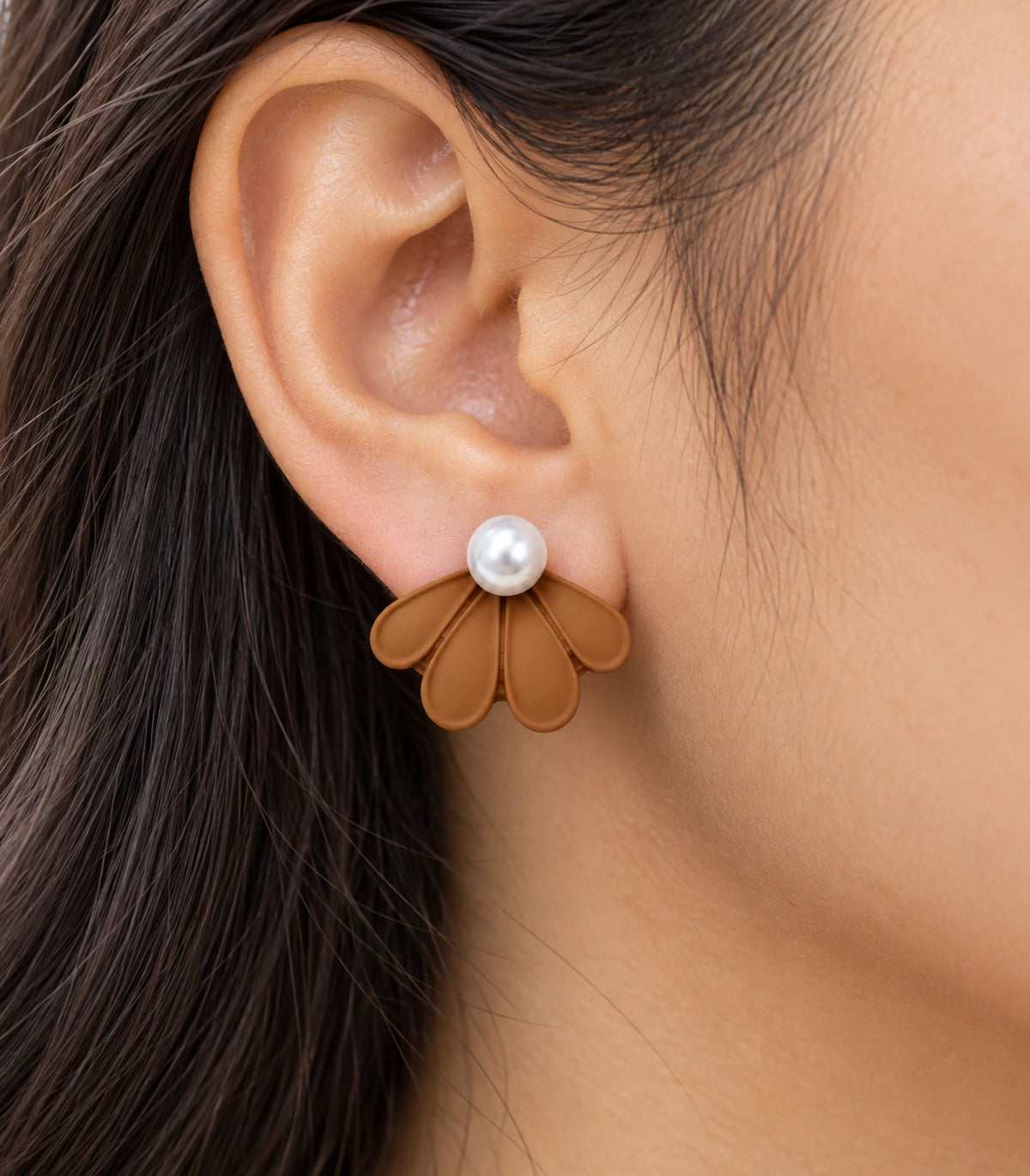 JIMIKI Camel pearl fan petal stud earrings, worn closeup of four petals and pearl-style bead #color_camel