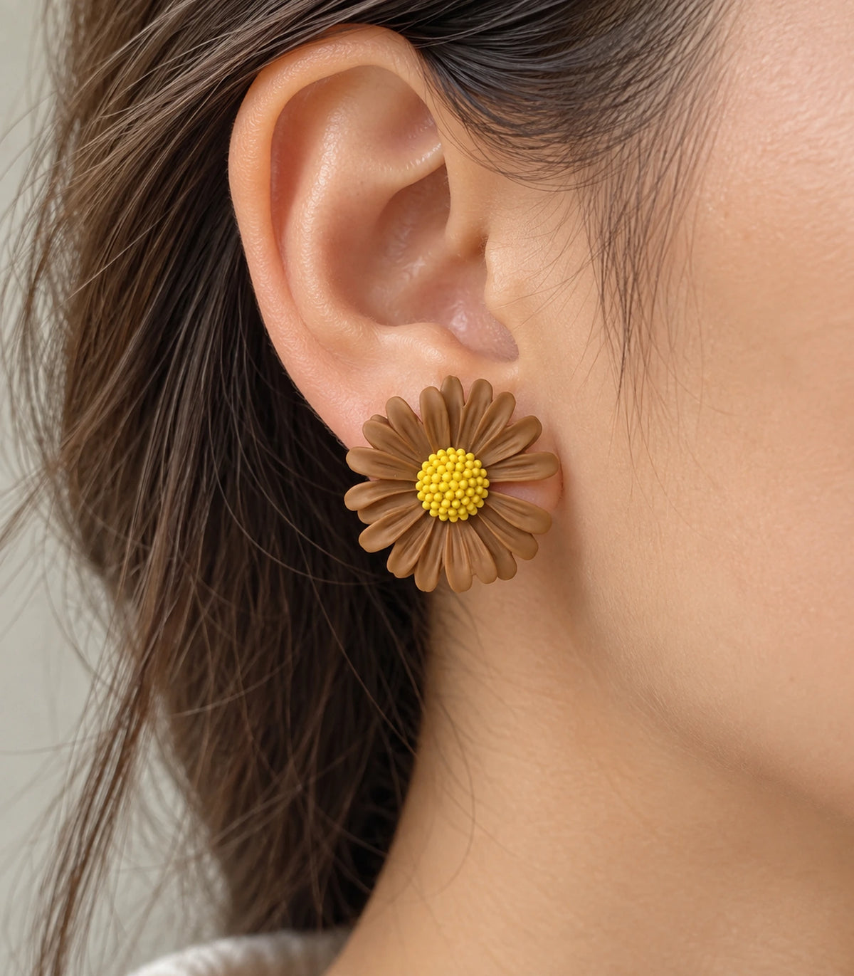 JIMIKI Camel yellow centre daisy stud earrings, close-up of grooved petals and yellow centre #color_camel
