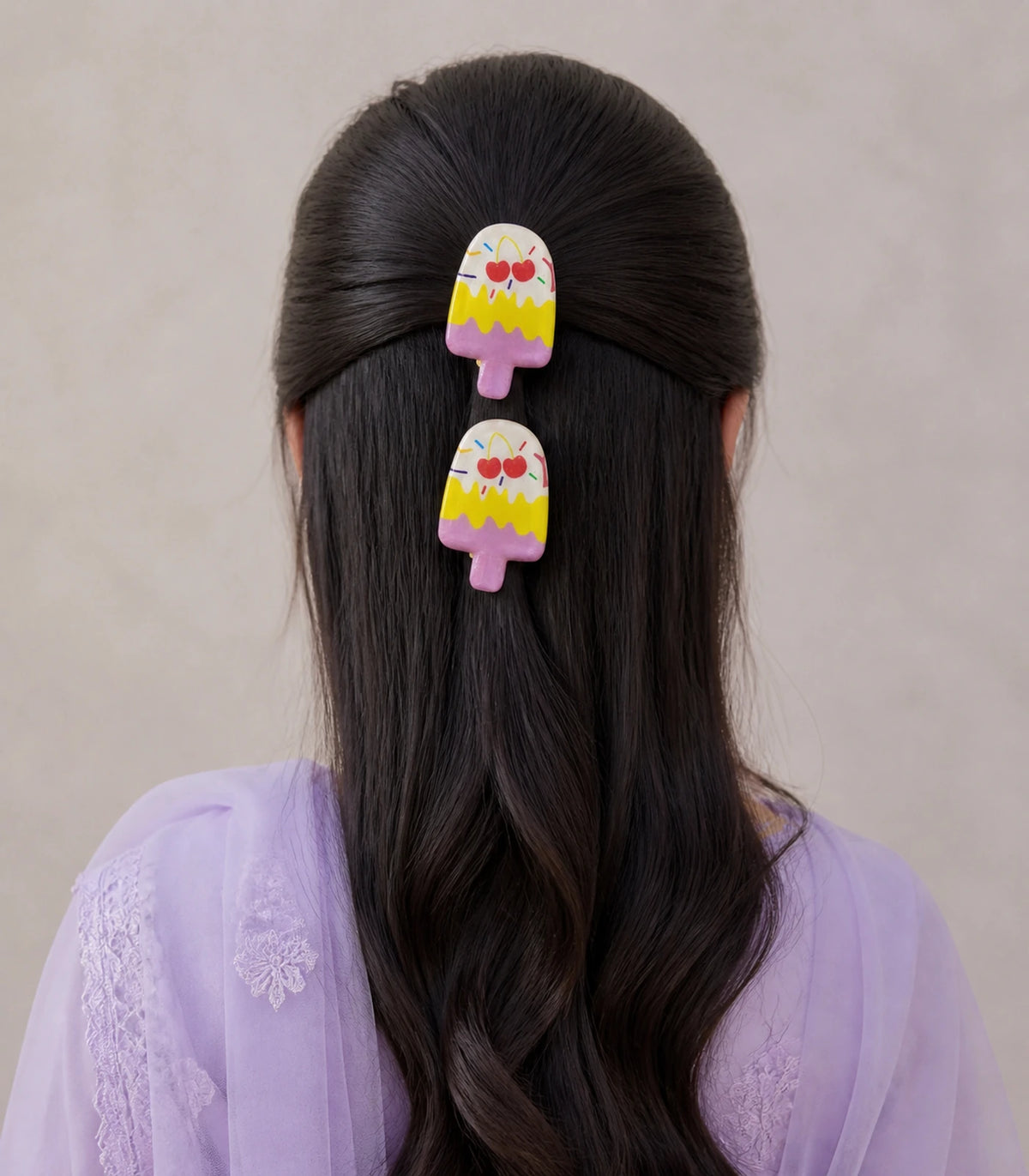 Model wearing the Cherry Sprinkle Layered Popsicle Clip Pair