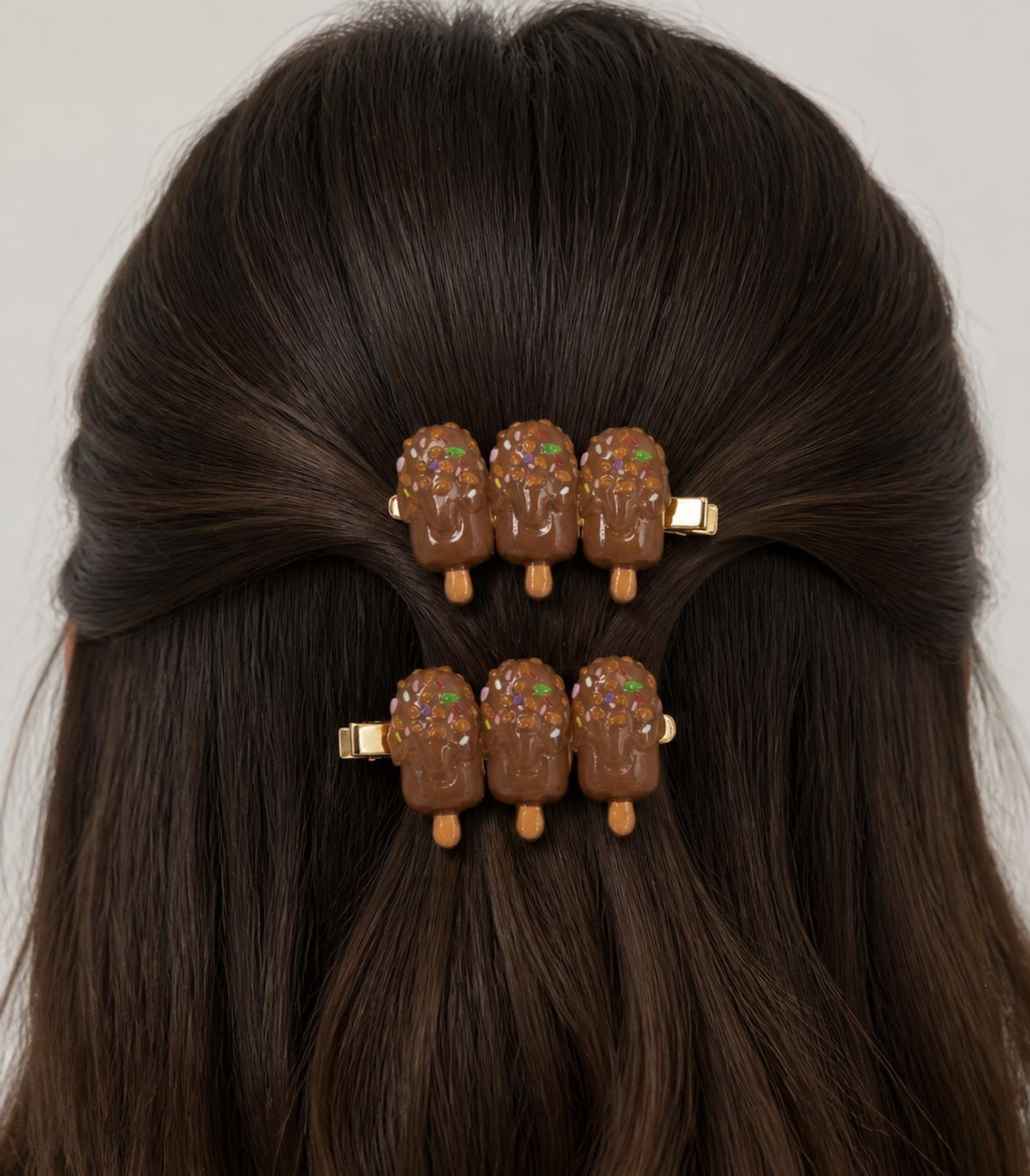 Chocolate Iced Pop Trio Clip Pair in a styled editorial view