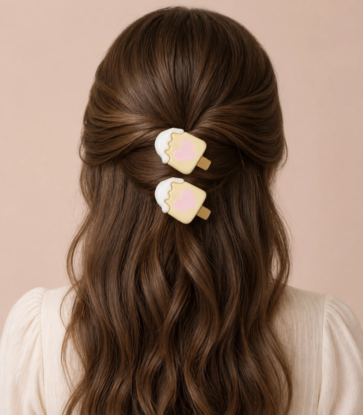 Model wearing the Cream Heart Popsicle Clip Pair