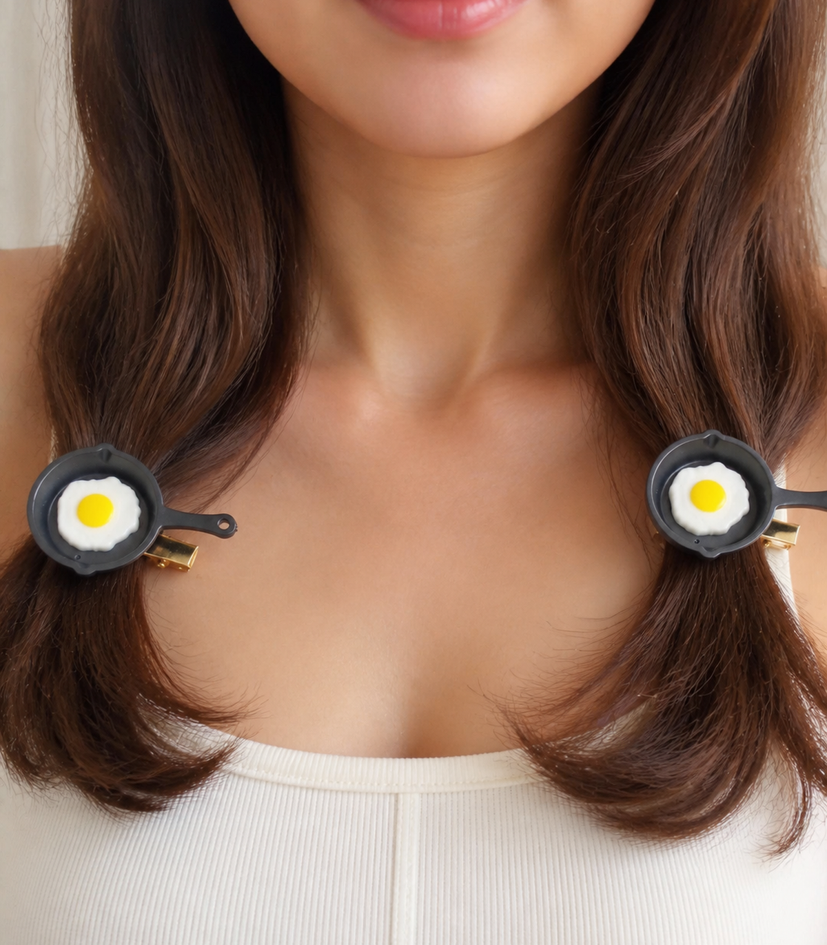 JIMIKI Sunny-Side-Up Egg Pan Barrette Pair in Black / White / Yellow, worn hairstyle view