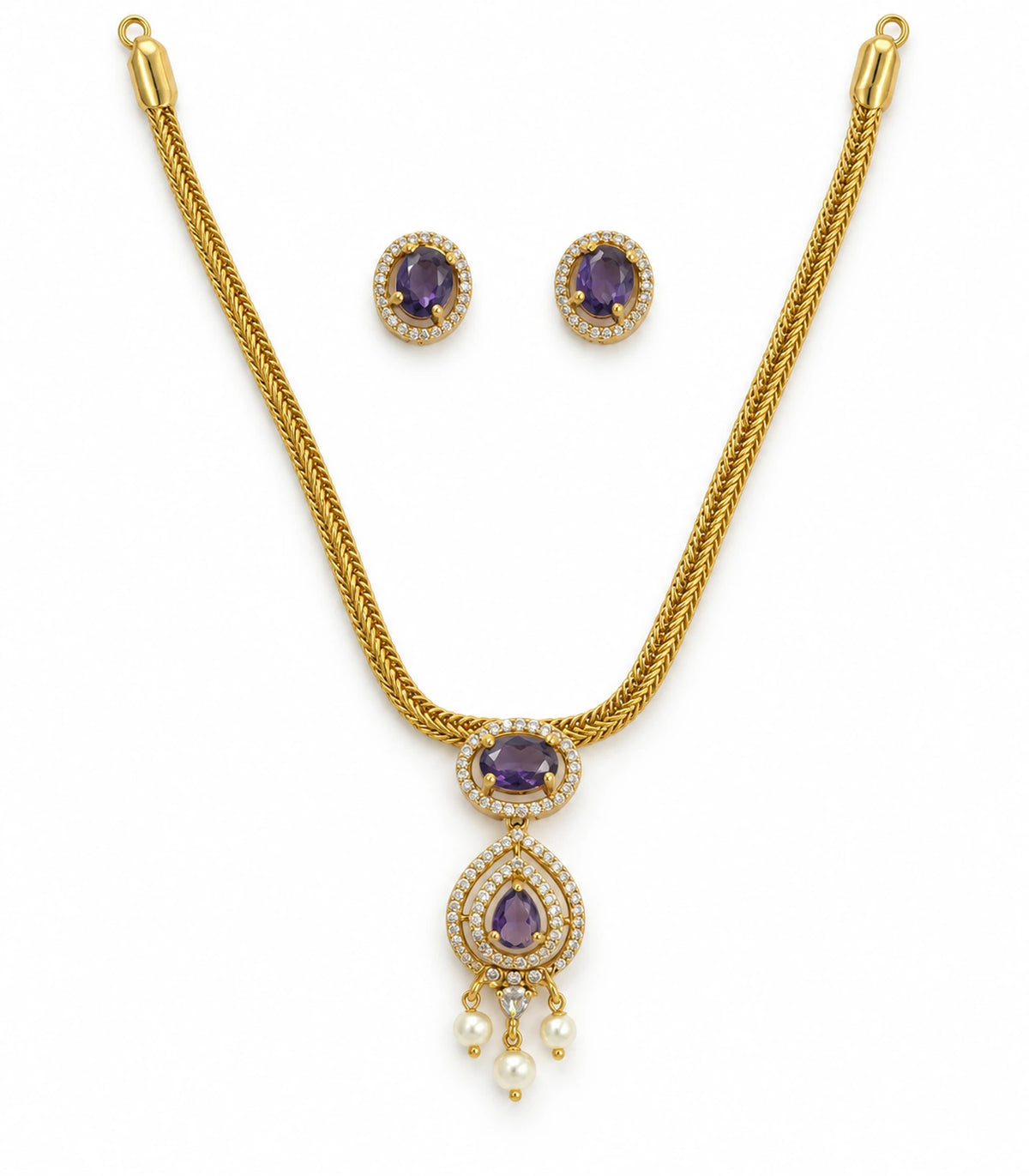Gold-tone purple pendant necklace with three pearl-like drops and matching pair of oval stud earrings on white background
