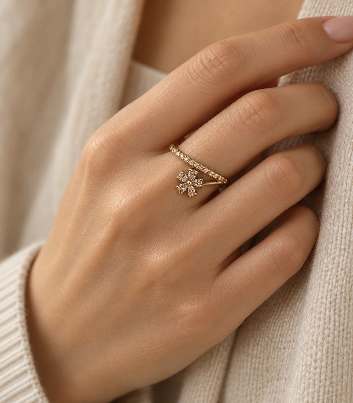 Gold Champagne Crystal Flower Sweep Ring — ring worn in a distinct hand-on-knit pose