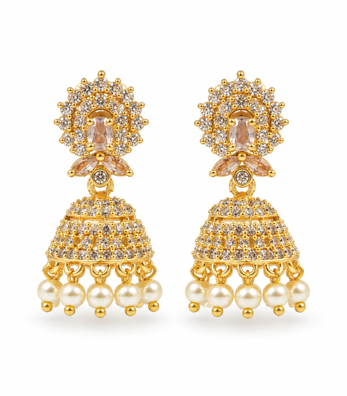 Complete pair of gold-tone champagne oval halo jhumka earrings with clear stone bells and cream pearl-style fringe on white