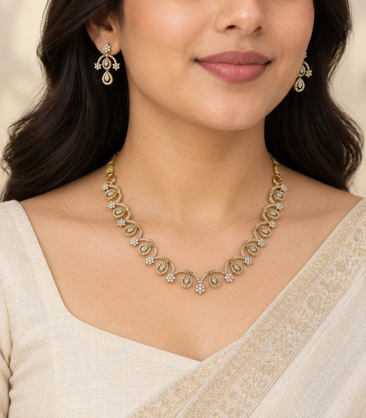 Gold Clear Loop Crystal Necklace Set worn with an ivory outfit