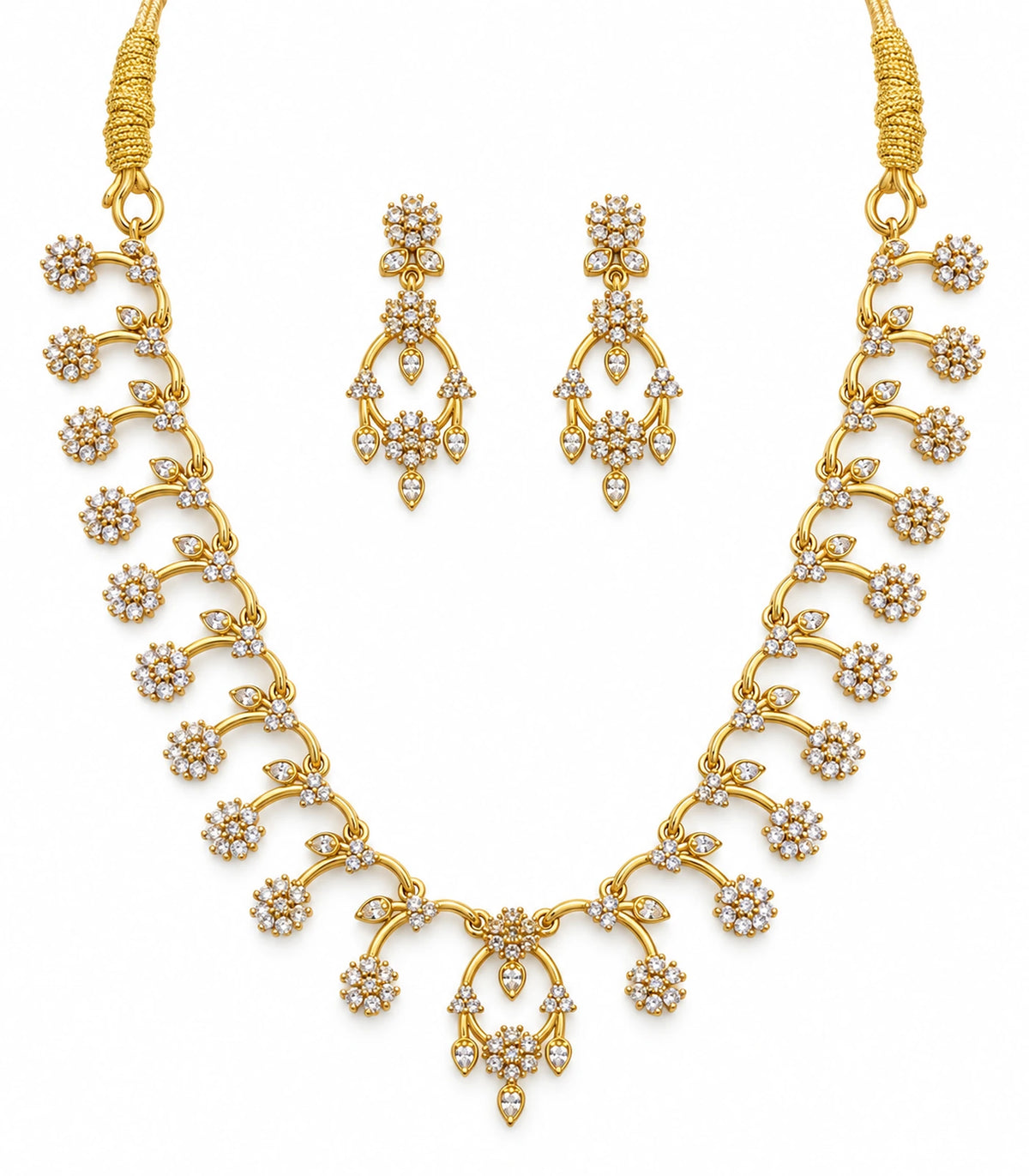 Gold-tone clear floral open-loop necklace with matching drop earrings on white