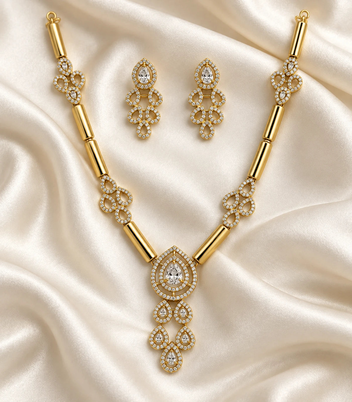 Gold Clear Teardrop Tubular-Link Necklace Set - editorial flatlay view