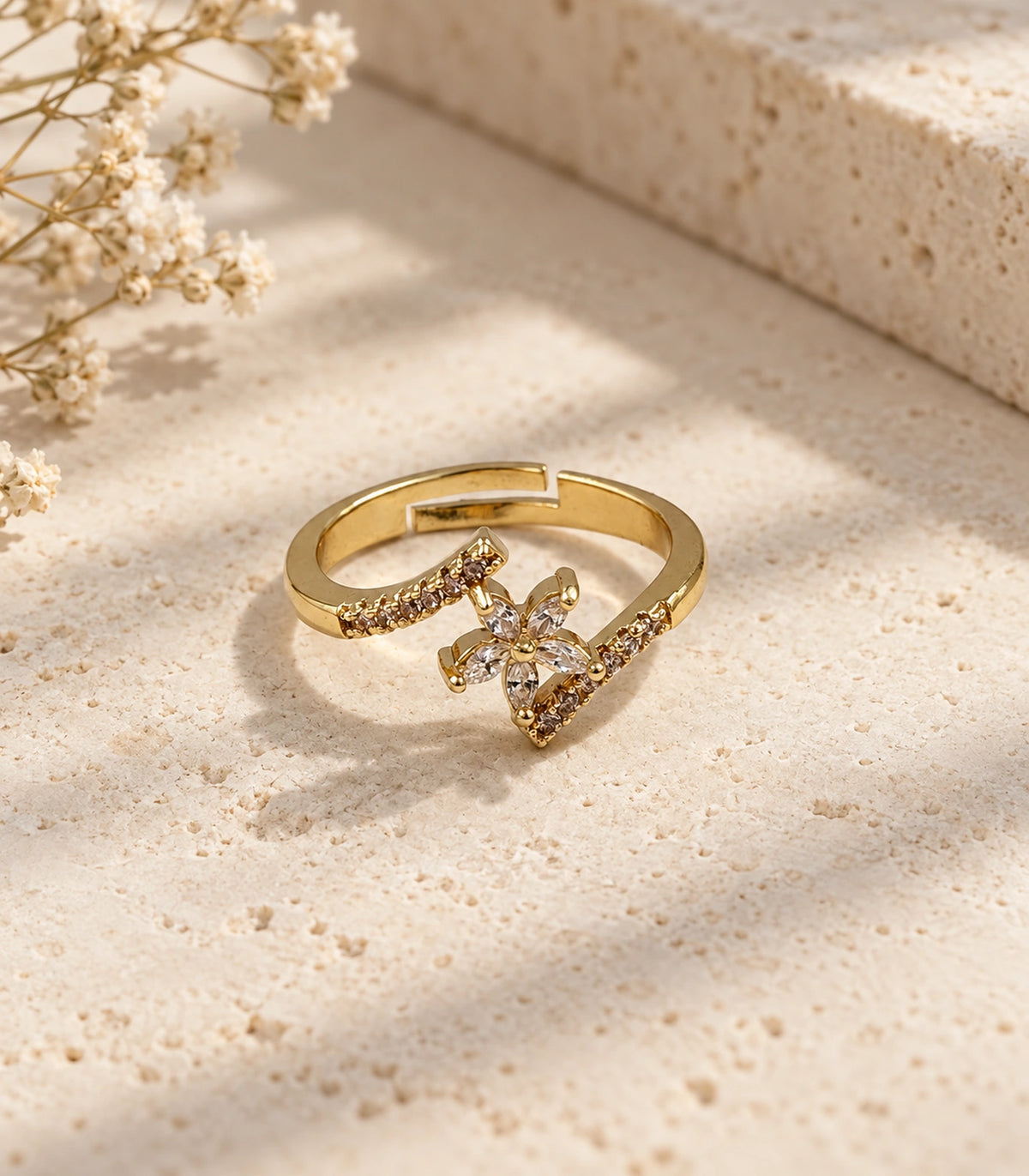One complete gold-tone sweep ring in a styled flatlay