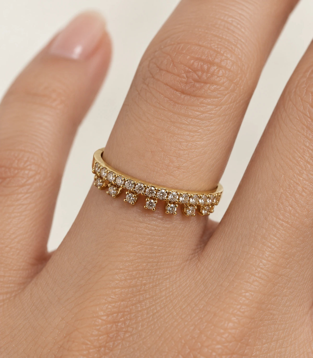 Gold Crystal Fringe Band Ring, close detail on a finger