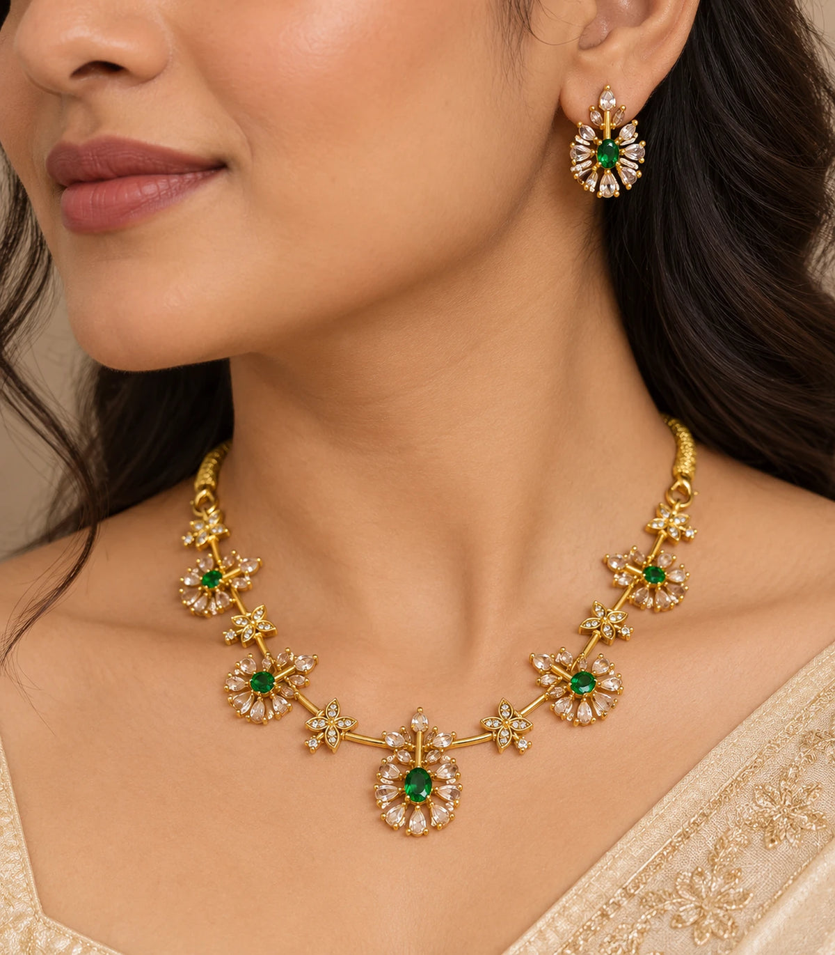 Close view of Gold Emerald Floral Crystal Necklace Set and matching earring worn
