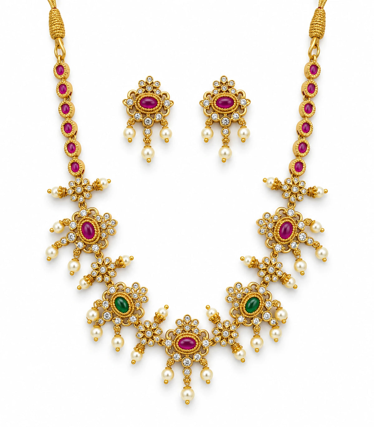 Gold-tone magenta and green floral necklace set with matching pearl-detail earrings on white