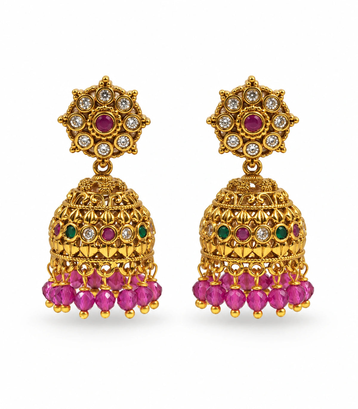 Complete pair of gold-tone floral jhumka earrings with magenta bead fringe on white