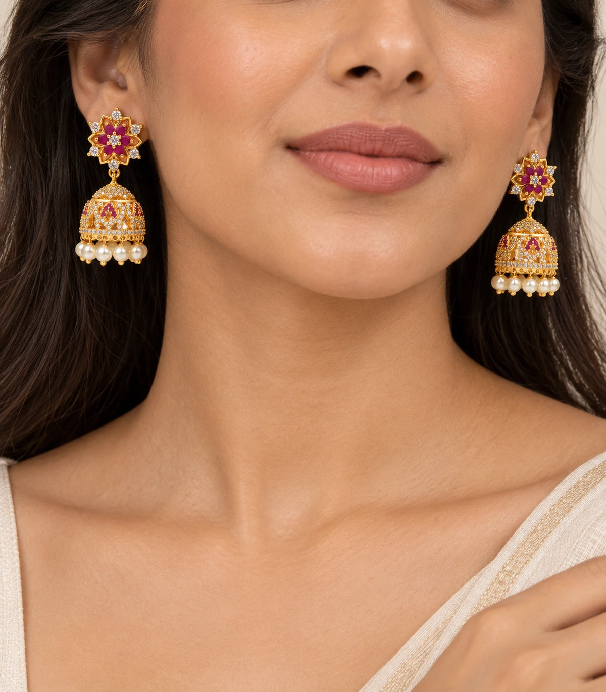 Gold Magenta Floral Crystal Pearl Jhumka Earrings — pair worn with floral studs and pearl-fringed bells