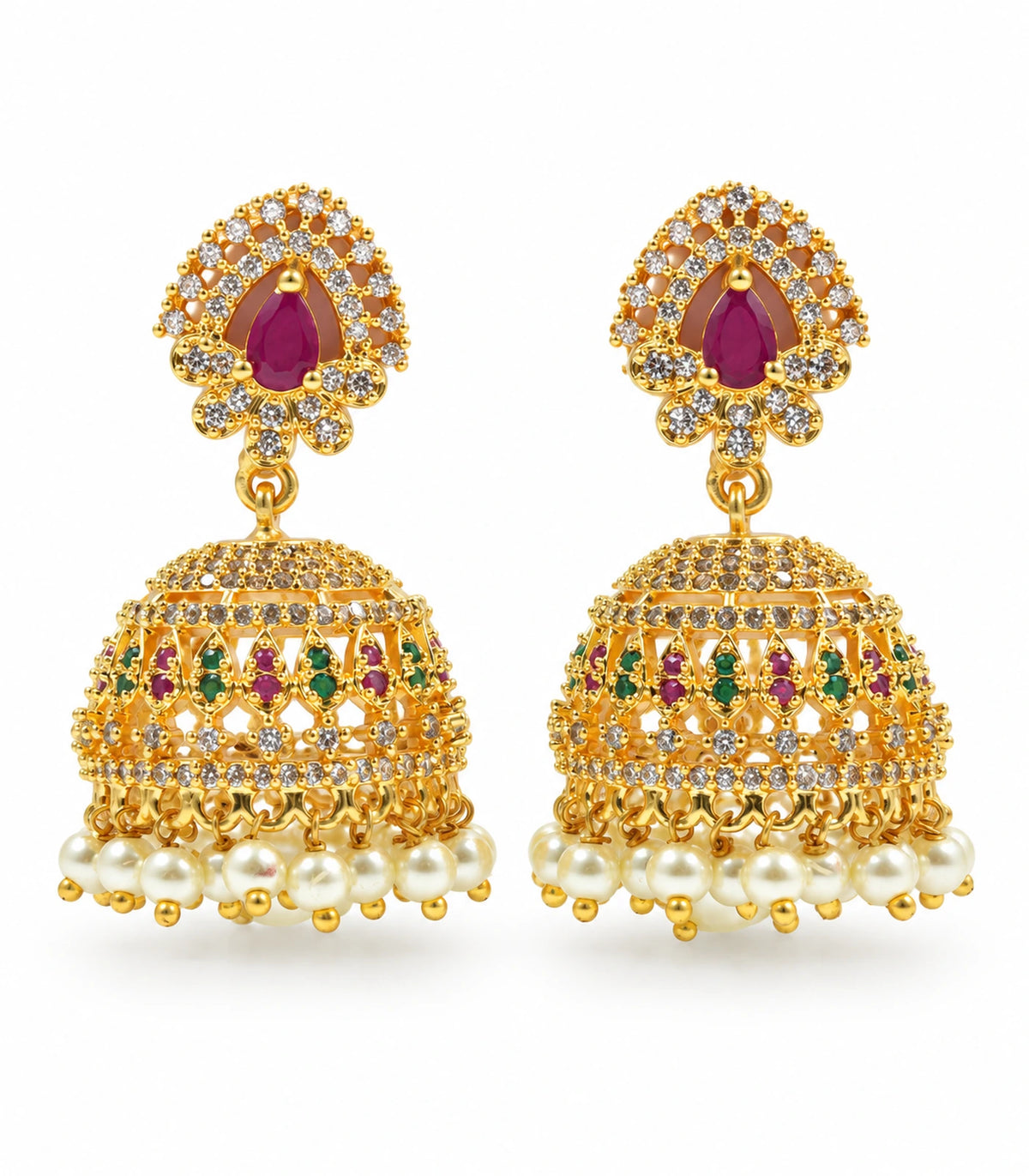 Pair of gold-tone jhumka earrings with magenta teardrop tops, green and magenta lattice domes and white pearl-look fringe on white