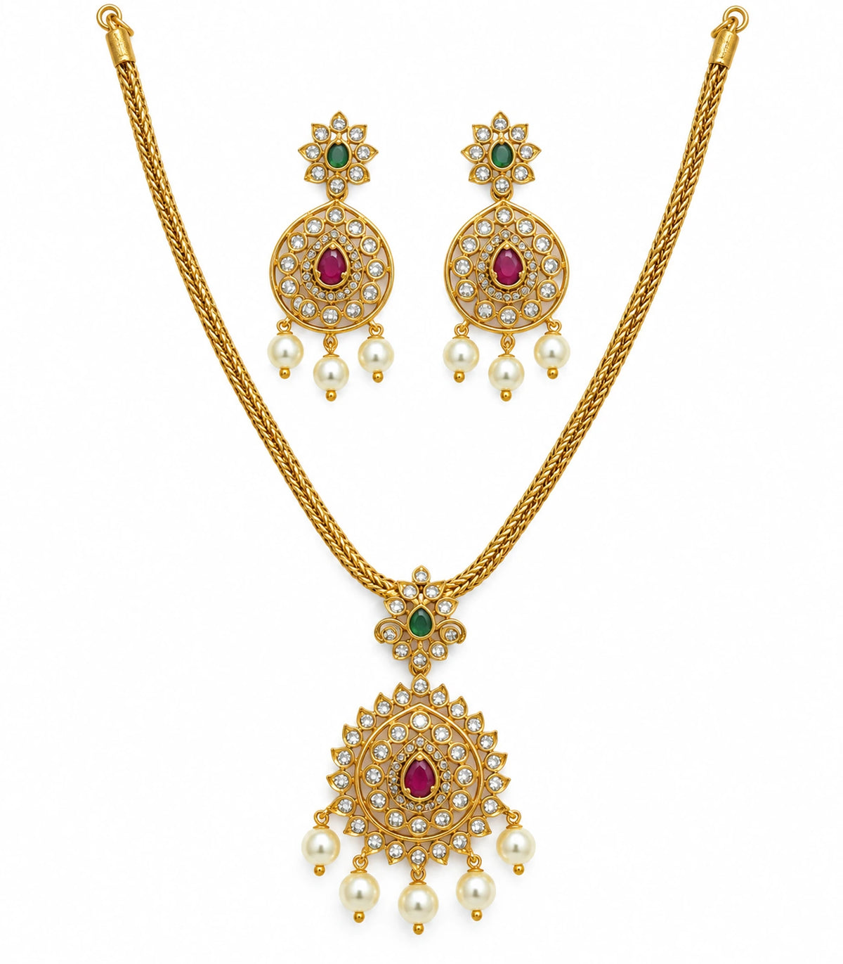 Gold-tone magenta pendant necklace set with green accents and two matching pearl-like drop earrings on white