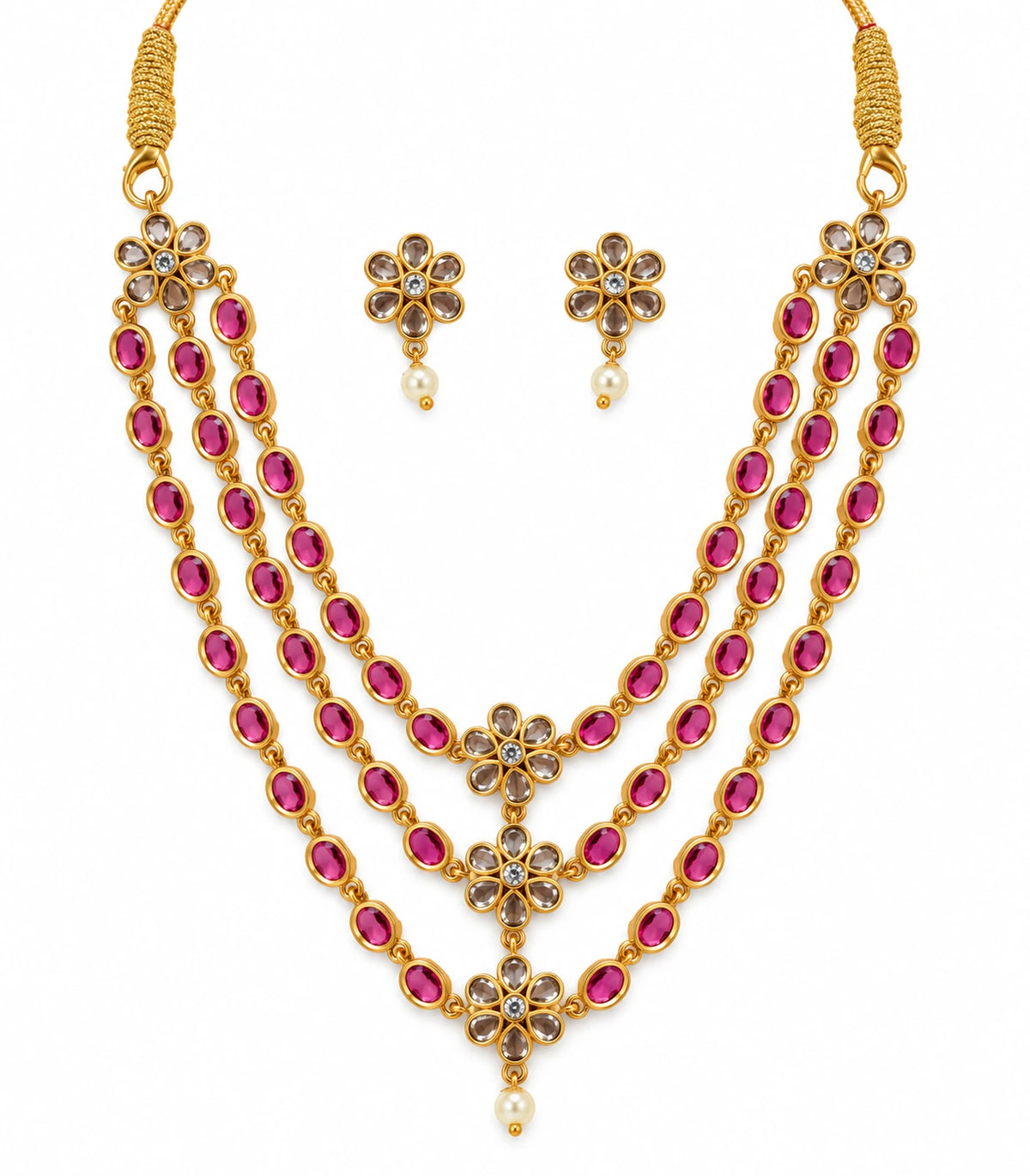 Gold-tone magenta triple-strand floral necklace with matching pearl-like drop earrings on white background