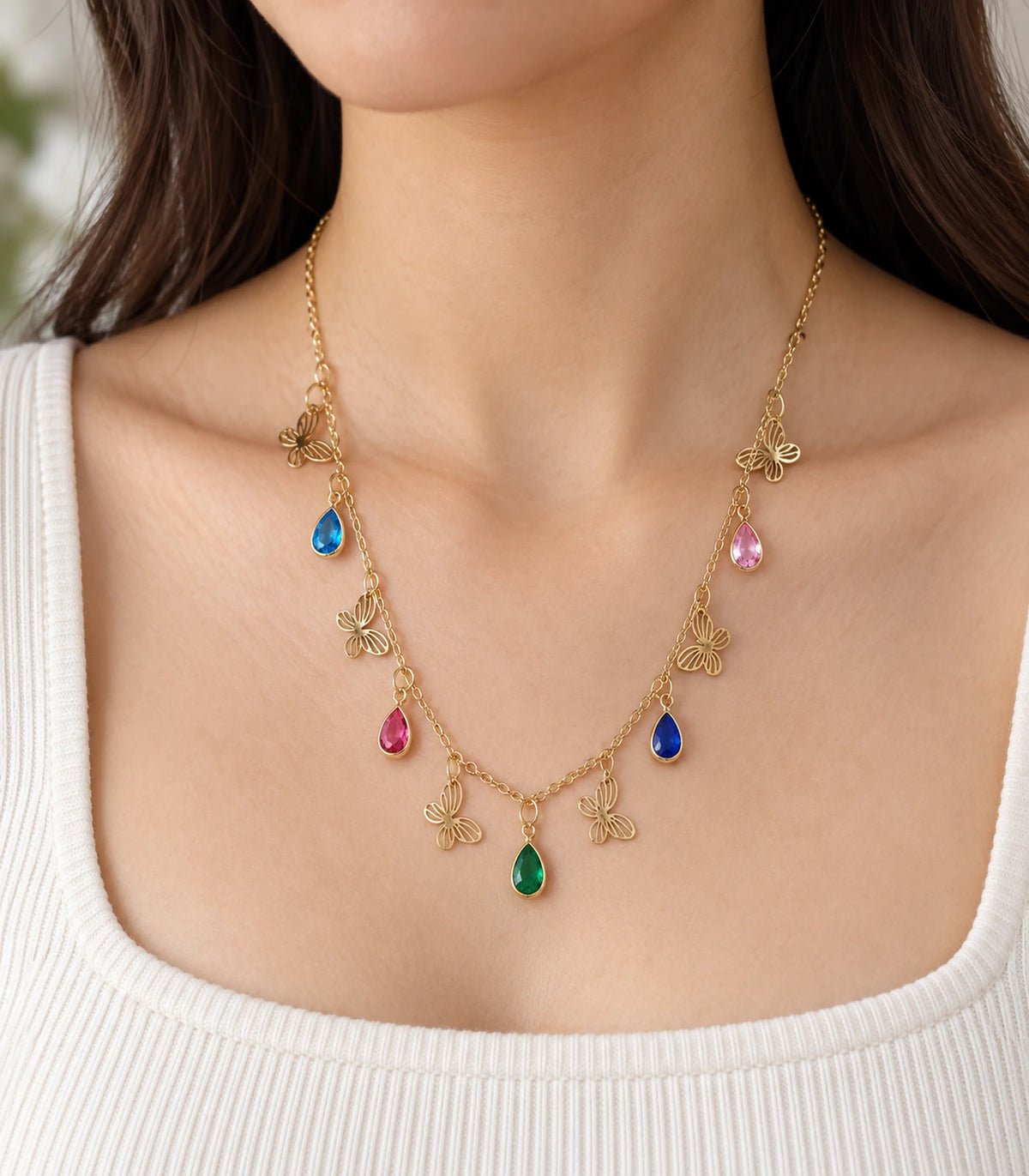 JIMIKI Gold Multicolor Teardrop Butterfly Charm Necklace - close-up of the worn butterflies and coloured teardrops #color_gold