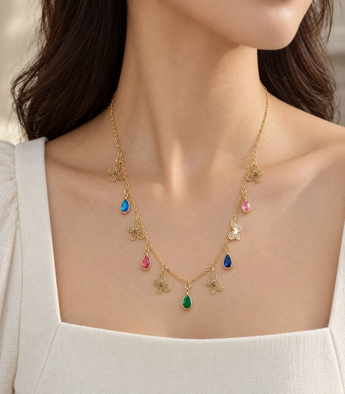 JIMIKI Gold Multicolor Teardrop Butterfly Charm Necklace - necklace in a styled model view #color_gold