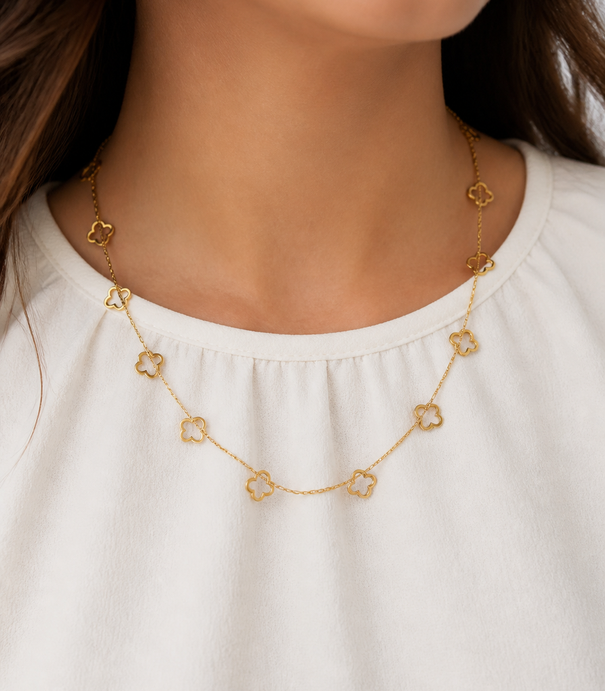 Gold Open Clover Charm Necklace styled on a model