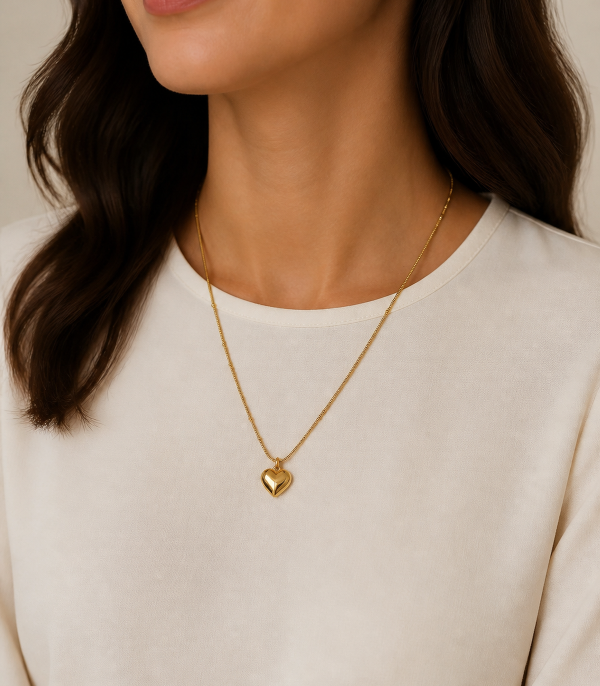 Gold Puffed Heart Bead Necklace worn by a model