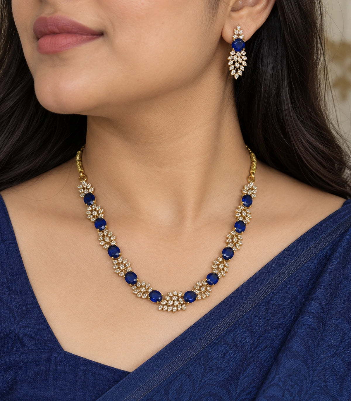 Closeup of Gold Sapphire Round Crystal Necklace Set and matching earring