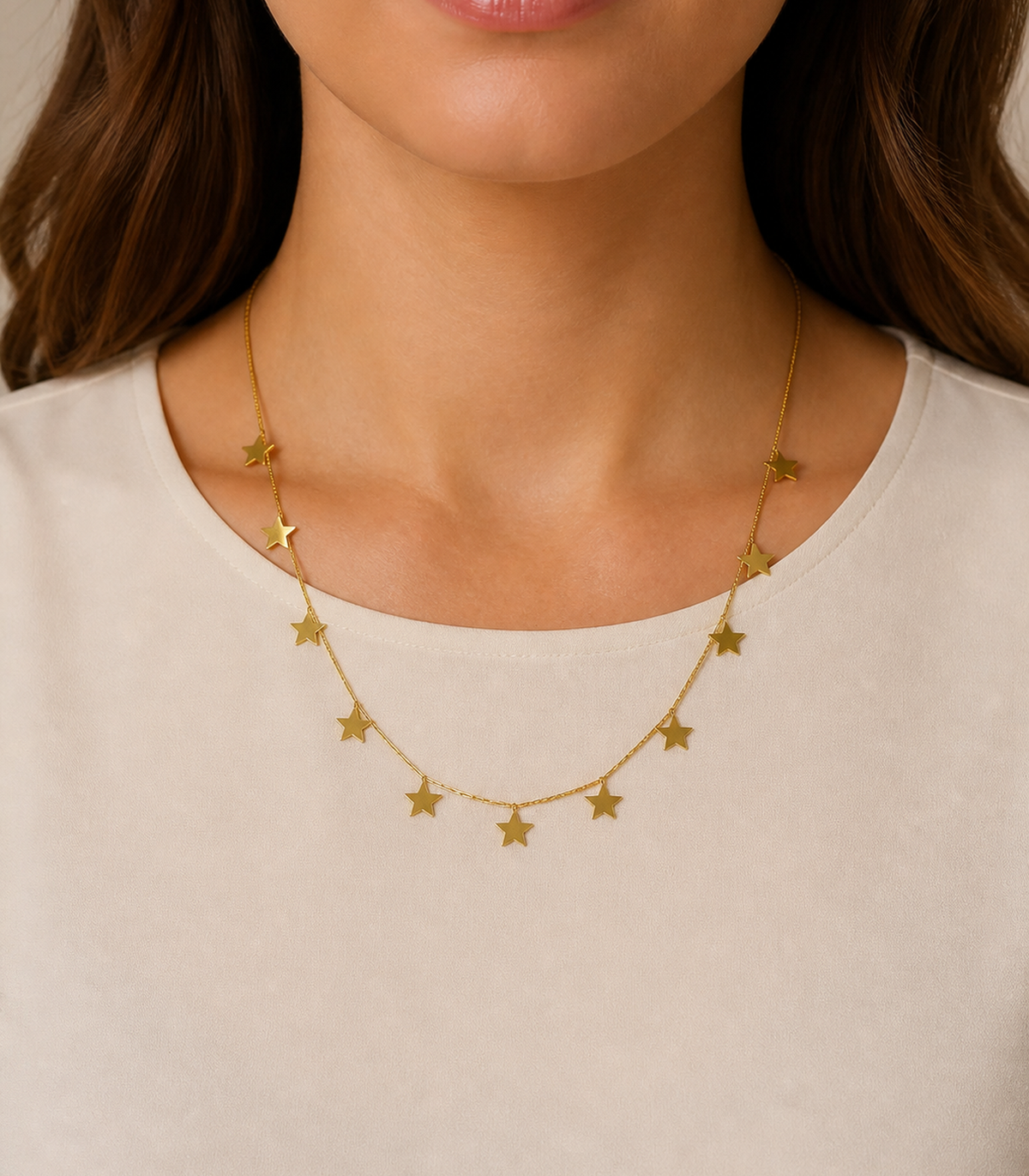 Gold Star Charm Necklace worn by a model