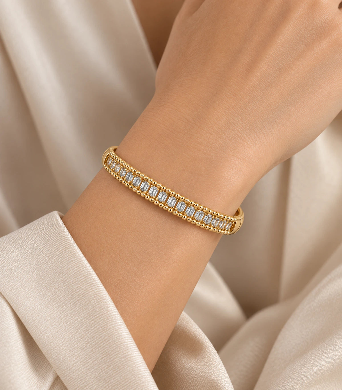JIMIKI Gold-Tone Baguette Beaded Frame Bangle — bangle styled with an outfit #color_gold-tone / clear