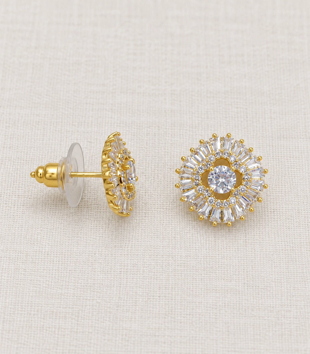 JIMIKI Baguette Halo Round Crystal Stud Earring Pair in Gold Tone, editorial flat lay #color_gold tone